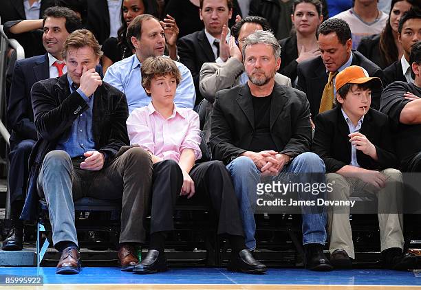 Liam Neeson, Michael Neeson, Aidan Quinn and Daniel Neeson attend New Jersey Nets vs New York Knicks game at Madison Square Garden on April 15, 2009...