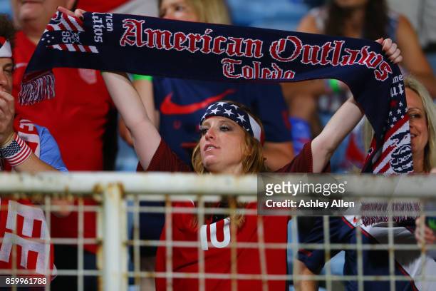 Fan shows her support during the FIFA World Cup Qualifier match between Trinidad and Tobago at the Ato Boldon Stadium on October 10, 2017 in Couva,...