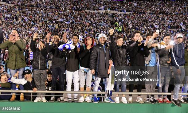 Fans of Uruguay celebrate the victory and qualifying to the World Cup after a match between Uruguay and Bolivia as part of FIFA 2018 World Cup...