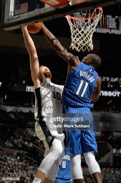 Matt Costello of the San Antonio Spurs goes to the basket against the Orlando Magic during a preseason game on October 10, 2017 at the AT&T Center in...