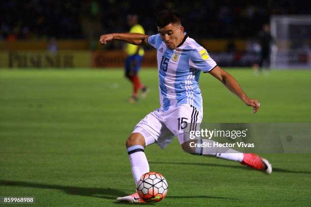 Marcos Acuña of Argentina takes a shot during a match between Ecuador and Argentina as part of FIFA 2018 World Cup Qualifiers at Olimpico Atahualpa...