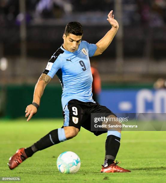 Luis Suarez of Uruguay kicks the ball during during a match between Uruguay and Bolivia as part of FIFA 2018 World Cup Qualifiers at Centenario...