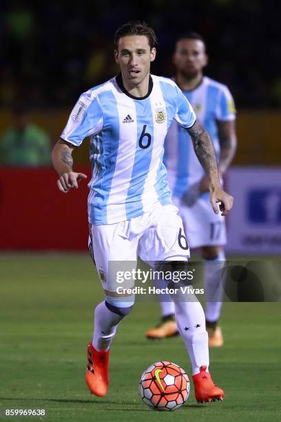 Lucas Biglia of Argentina drives the ball during a match between Ecuador and Argentina as part of FIFA 2018 World Cup Qualifiers at Olimpico...