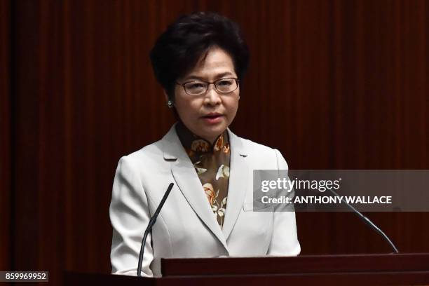 Hong Kong's Chief Executive Carrie Lam delivers her first policy address in the main chamber of the Legislative Council in Hong Kong on October 11,...