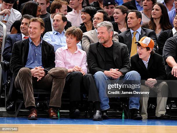 Liam Neeson, Michael Neeson, Aidan Quinn and Daniel Neeson attend New Jersey Nets vs New York Knicks game at Madison Square Garden on April 15, 2009...