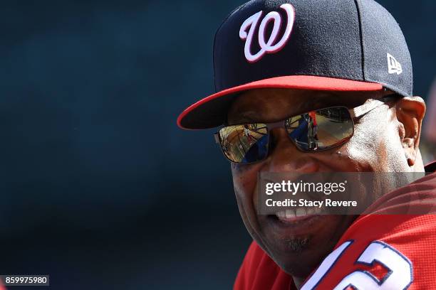 Head coach Dusty Baker of the Washington Nationals watches his team prior to game three of the National League Divisional Series against the Chicago...