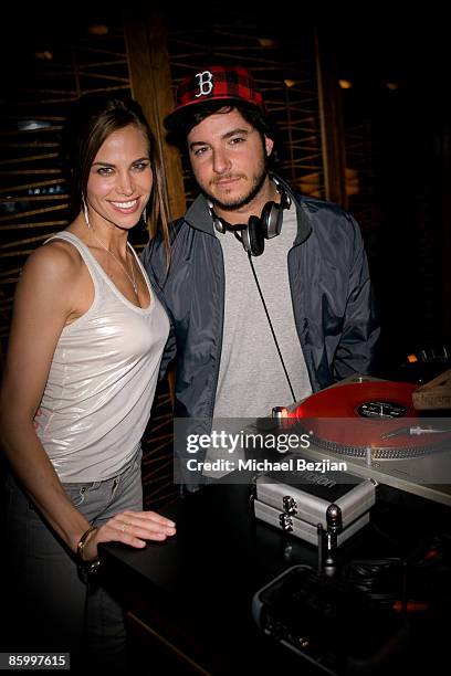 Brooke Burns and DJ attend the DVD release party for 'The Art Of Travel' at Stone Rose on April 15, 2009 in Los Angeles, California.