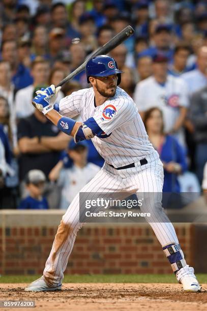 Kris Bryant of the Chicago Cubs at bat against the Washington Nationals during game three of the National League Divisional Series at Wrigley Field...