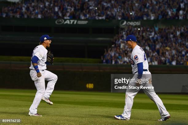 Javier Baez of the Chicago Cubs reacts after Anthony Rizzo makes the final out against the Washington Nationals during game three of the National...