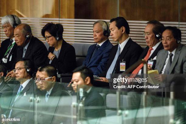 Lam Siu-por , husband of Hong Kong's Chief Executive Carrie Lam, listens as his wife delivers her first policy address at the Legislative Council in...