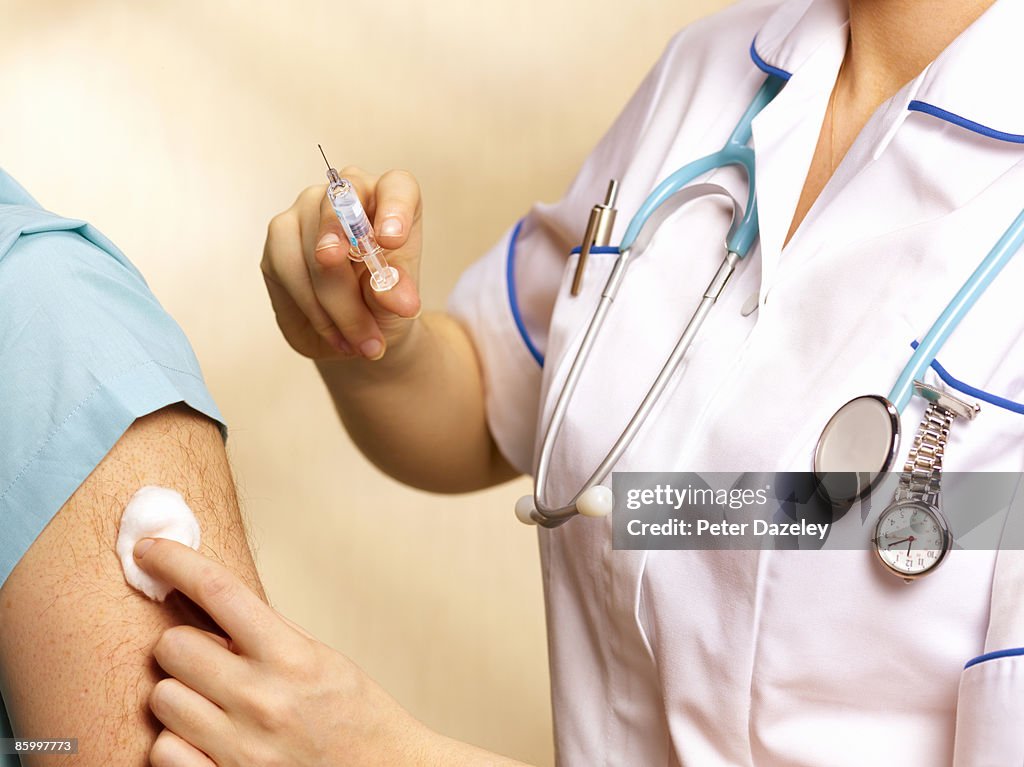 60 year old getting flu jab.