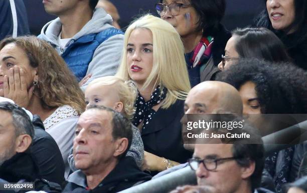 Erika Choperena, wife of Antoine Griezmann of France and their daughter Mia Griezmann attend the FIFA 2018 World Cup Qualifier between France and...