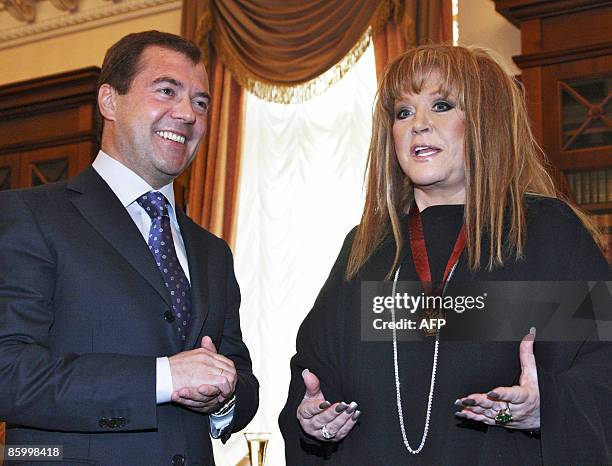 Russian President Dmitry Medvedev congratulates Russian singer Alla Pugachyova on her birthday in Moscow on April 15, 2009. Medvedev awarded...