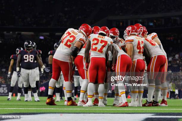 The Kansas City Chiefs huddle in the second half against the Houston Texans at NRG Stadium on October 8, 2017 in Houston, Texas.