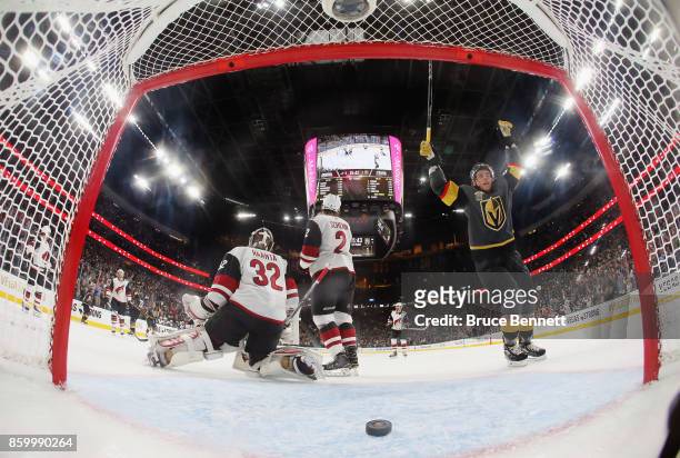 Erik Haula of the Vegas Golden Knights celebrates a goal by Deryk Engelland at 4:18 of the first period against Antti Raanta of the Arizona Coyotes...