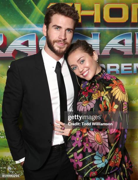 Liam Hemsworth and Miley Cyrus attend the premiere of Disney And Marvel's "Thor: Ragnarok" on October 10, 2017 in Los Angeles, California.