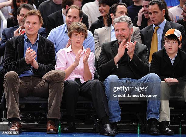 Liam Neeson, Michael Neeson, Aidan Quinn and Daniel Neeson attend New Jersey Nets vs New York Knicks game at Madison Square Garden on April 15, 2009...