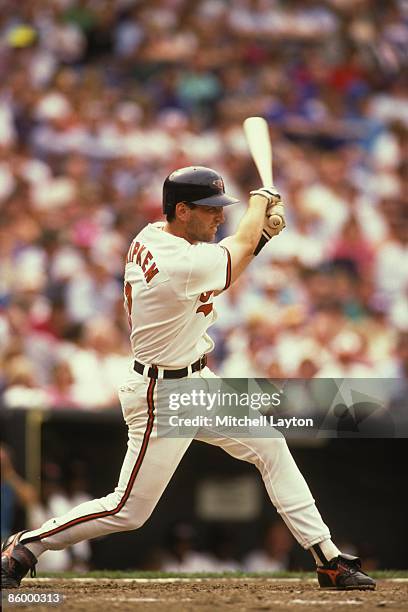 Bily Ripken of the Baltimore Orioles takes a swing during a baseball game on July 1, 1990 at Memorial Stadium in Baltimore, Maryland.