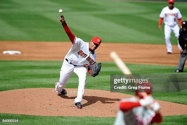 Daniel Cabrera of the Washington Nationals pitches against the Philadelphia Phillies at Nationals Park on April 13, 2009 in Washington, DC.