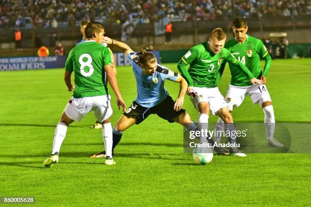 Diego Bejarano , Gaston Silva , Alejandro Chumacero and Raul Castro vie for the ball during the 2018 FIFA World Cup Qualification match between...