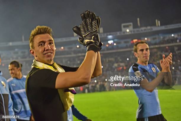 Uruguay's goalkeeper Fernando Muslera celebrating the classification to the world after the 2018 FIFA World Cup Qualification match between Uruguay...