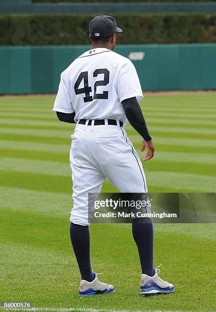 Curtis Granderson of the Detroit Tigers looks on wearing jersey and special spikes to honor Jackie Robinson against the Chicago White Sox during the...