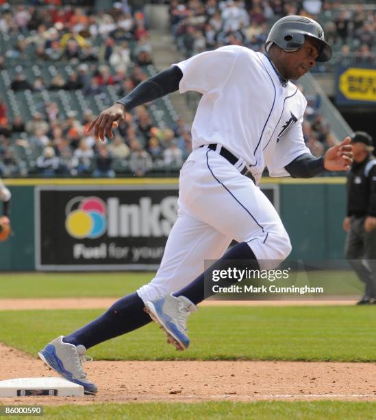 Curtis Granderson of the Detroit Tigers runs against the Chicago White Sox during the Jackie Robinson Day game at Comerica Park on April 15, 2009 in...