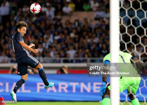 Shu Kurata of Japan heads to score the opening goal during the international friendly match between Japan and Haiti at Nissan Stadium on October 10,...