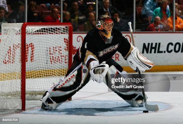 Jonas Hiller of the Anaheim Ducks handles the puck against the Dallas Stars at the Honda Center on April 10, 2009 in Anaheim, California. The Ducks...