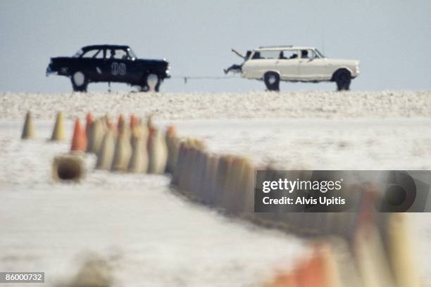 Racer is towed back after a run during Speed Week on the Bonneville Salt flats in August 1974 near Wendover, Utah.