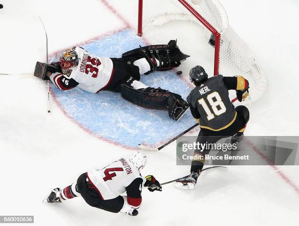 James Neal of the Vegas Golden Knights scores a powerplay goal at 10:42 of the first period against Antti Raanta of the Arizona Coyotes during the...