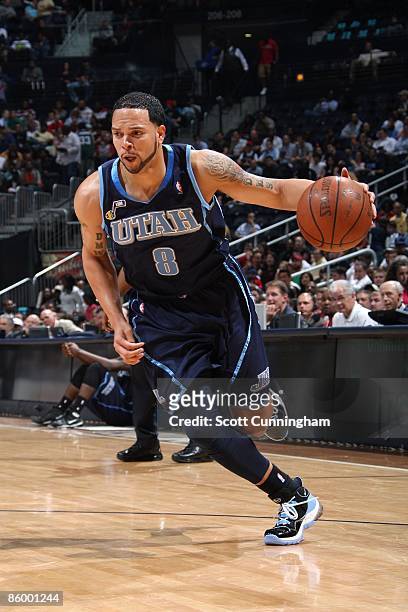 Deron Williams of the Utah Jazz moves the ball up court during the game against the Atlanta Hawks at Philips Arena on March 11, 2009 in Atlanta,...