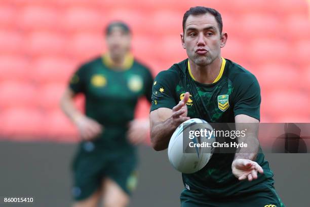 Cameron Smith passes during an Australian Kangaroos Rugby League World Cup training session at Suncorp Stadium on October 11, 2017 in Brisbane,...