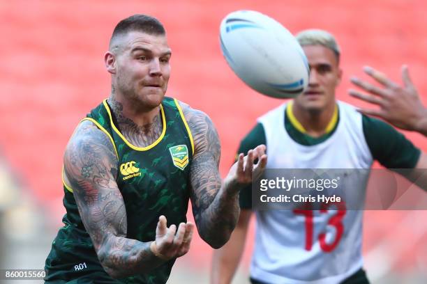 Josh Dugan passes during an Australian Kangaroos Rugby League World Cup training session at Suncorp Stadium on October 11, 2017 in Brisbane,...