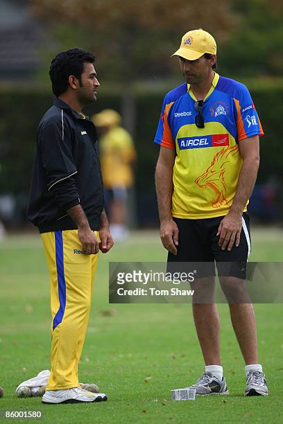 Mahendra Singh Dhoni of Chennai chats to coach Stephen Fleming during the Chennai Super Kings training session at the Vineyard Cricket Ground on...