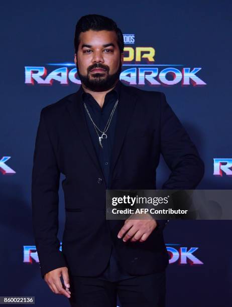 Actor Adrian Dev arrives for the premiere of the film "Thor: Ragnarok" in Hollywood, California on October 10, 2017. / AFP PHOTO / FREDERIC J. BROWN