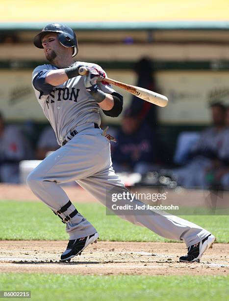 Dustin Pedroia of the Boston Red Sox bats against the Oakland Athletics during a Major League Baseball game on April 15, 2009 at the Oakland Coliseum...