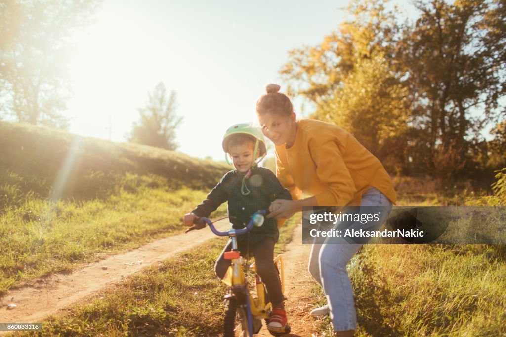 Learning To Ride A Bicycle High-Res Stock Photo - Getty Images