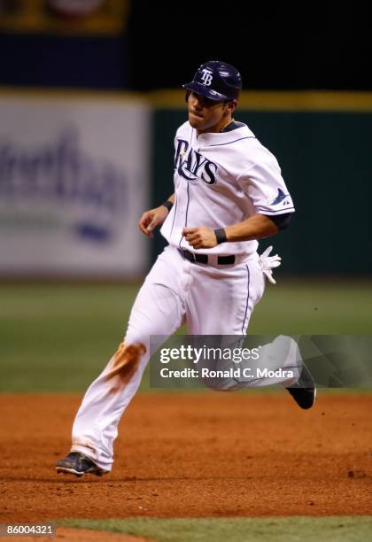 Carlos Pena of the Tampa Bay Rays runs to third base during a game against the New York Yankees on April 13, 2009 in St. Petersburg, Florida.