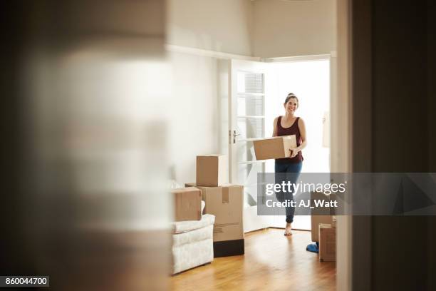 i bought the house of my dreams - woman on the move stock pictures, royalty-free photos & images