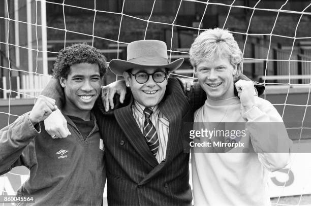 Watford FC gets set for Saturday's FA Cup Semi-final against Plymouth Argyle. Left to right, John Barnes, Chairman Elton John and Mo Johnston, 11th...