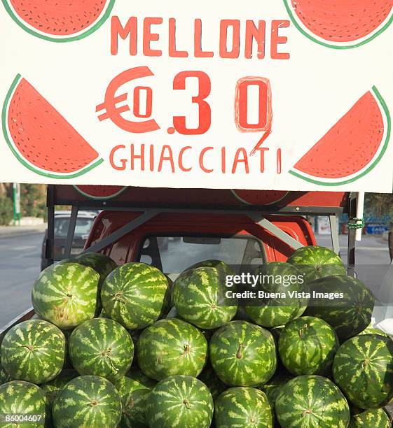 italy. sicily. palermo, watermelons stand. - italiaanse tekst stockfoto's en -beelden