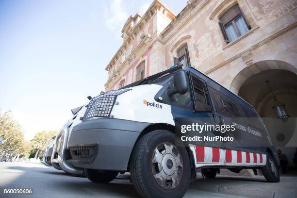 Catalonia's police block the acces to Catalonia's Parliament. Carles Puigdemont, president of the Catalan government, declares the republic and...
