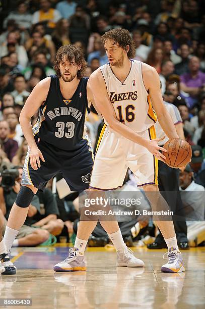 Pau Gasol of the Los Angeles Lakers drives the ball against Marc Gasol of the Memphis Grizzlies during the game on April 12, 2009 at Staples Center...