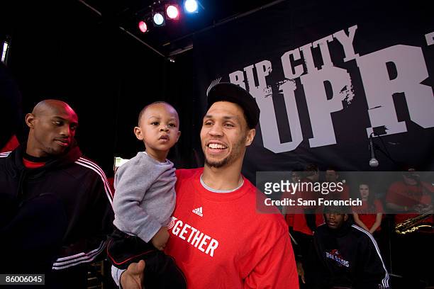 Brandon Roy of the playoff bound Portland Trail Blazers and his son Brandon Roy Jr. Join fans in celebration during a public playoff rally April 16,...