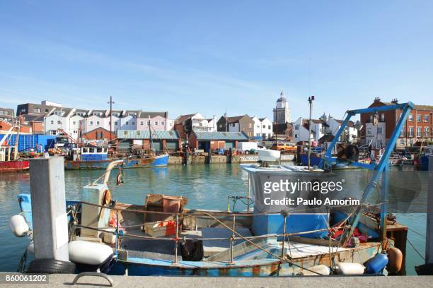 fishing boats at old port in portsmouth,united kingdom - portsmouth england stock pictures, royalty-free photos & images