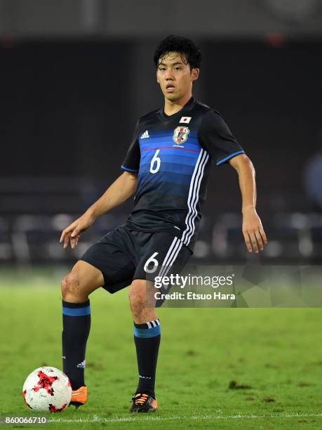 Wataru Endo of Japan in action during the international friendly match between Japan and Haiti at Nissan Stadium on October 10, 2017 in Yokohama,...