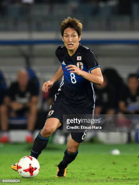 Genki Haraguchi of Japan in action during the international friendly match between Japan and Haiti at Nissan Stadium on October 10, 2017 in Yokohama,...