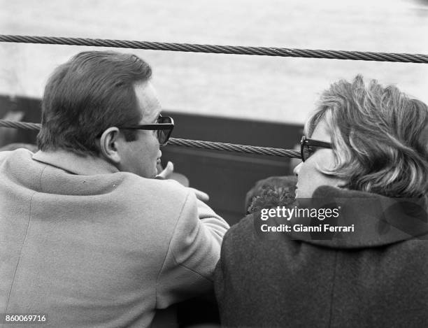 Italian actress Alida Valli and the Italian jazz pianist Romano Mussolin in a bullfight Madrid, Spain.