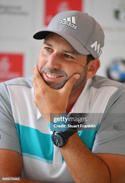 Sergio Garcia of Spain wears a wrist strapping as he looks on during a press conference ahead of the Italian Open at Golf Club Milano - Parco Reale...